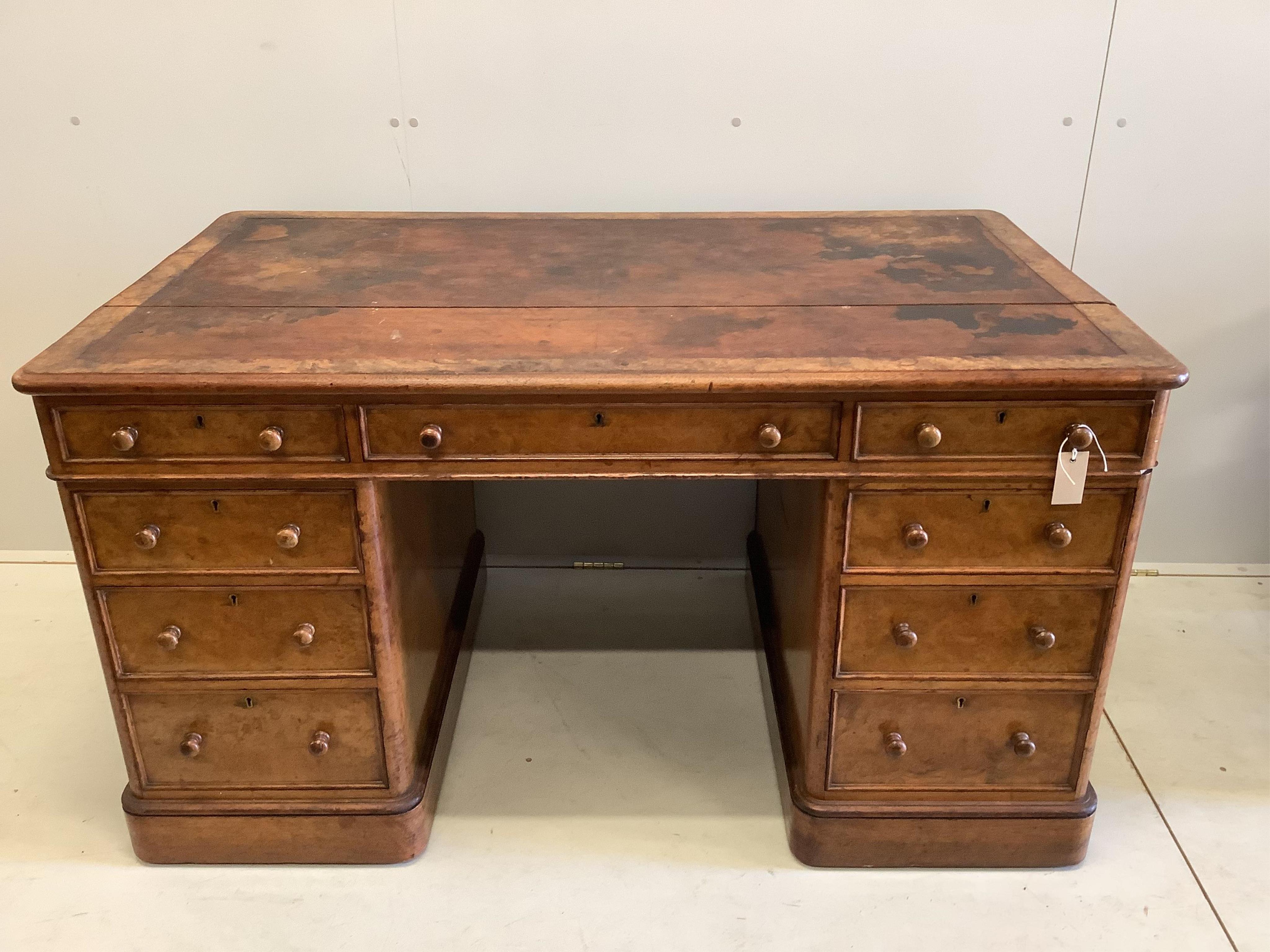 A Victorian burr walnut pedestal desk, width 140cm, depth 80cm, height 74cm. Condition - poor to fair